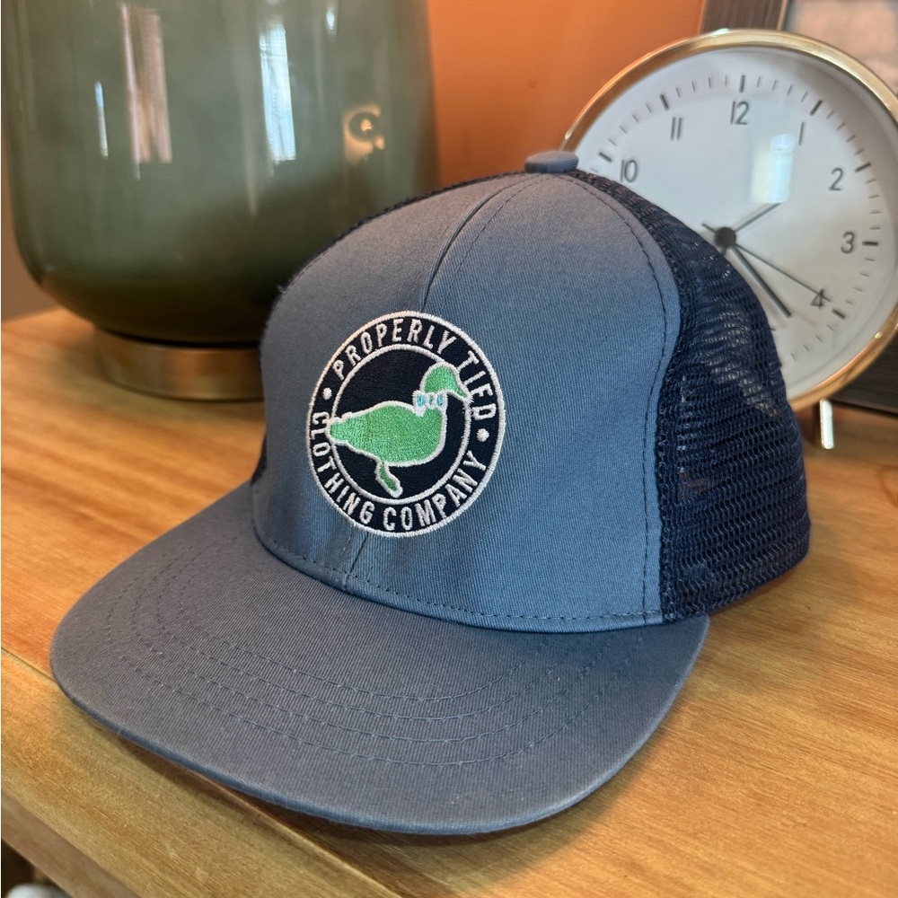 Properly Tied Kids' Navy Trucker Hat with Green Logo